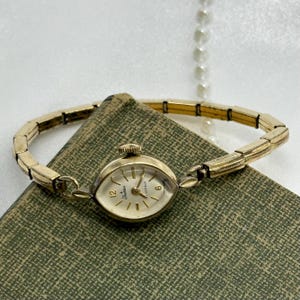 Dainty Gold Wind-Up Cocktail Watch