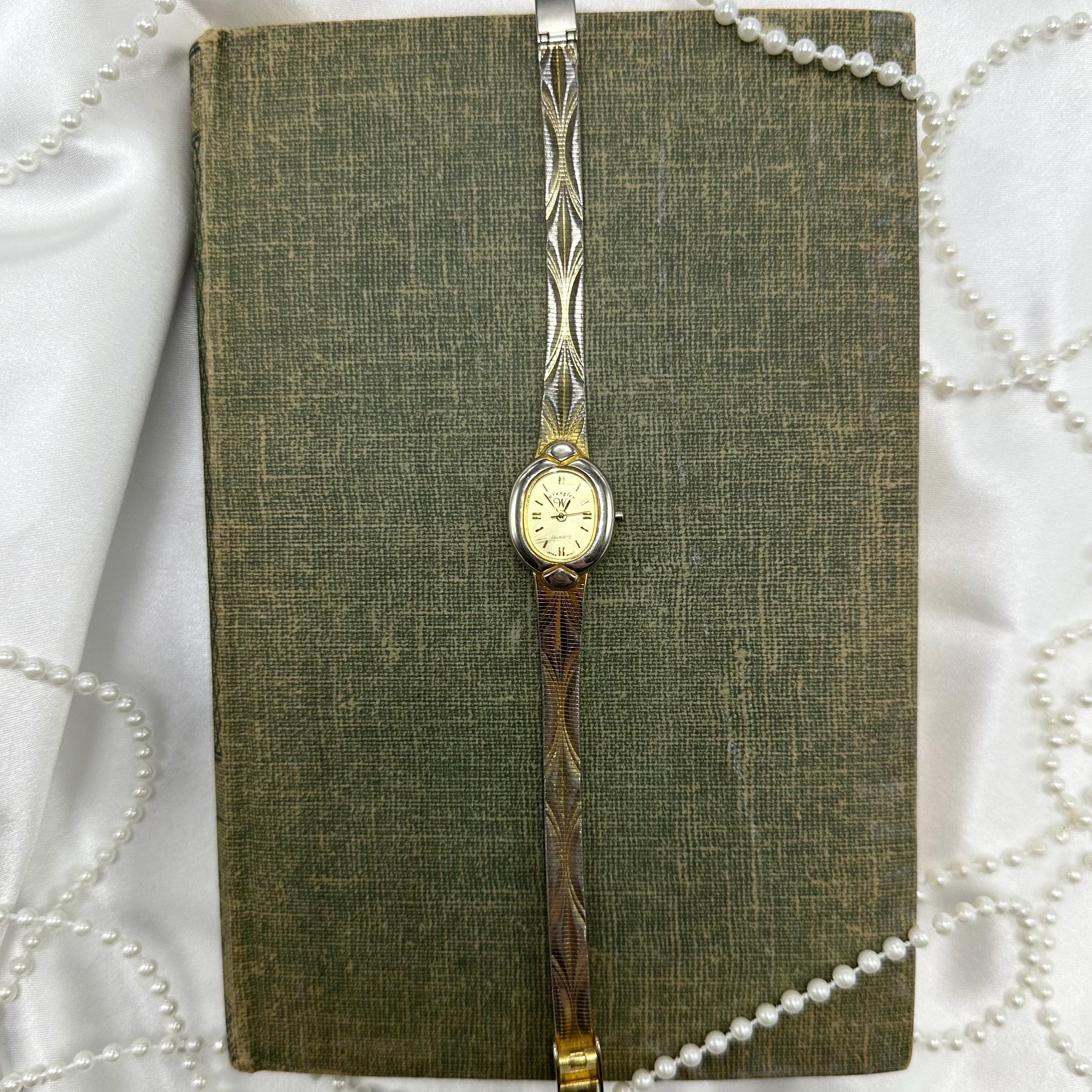 Detailed Two-Tone Oval Dial Watch