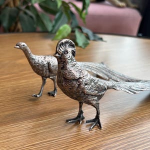 Silver plated bird figurine