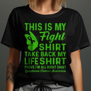 Könnte beinhalten: Schwarzes T-Shirt mit grünem Text und einer grünen Schmetterlingsgrafik. Der Text lautet "This is my Fight Shirt Take Back My Life Shirt Prove I'm All Right Shirt Lymphoma Cancer Awareness."
