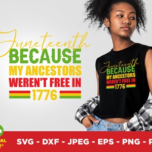 May include: Black sleeveless shirt with the text "Juneteenth BECAUSE MY ANCESTORS WEREN'T FREE IN 1776" in green, red, and yellow. The design includes a yellow script font and a horizontal stripe in the colors of the Pan-African flag.