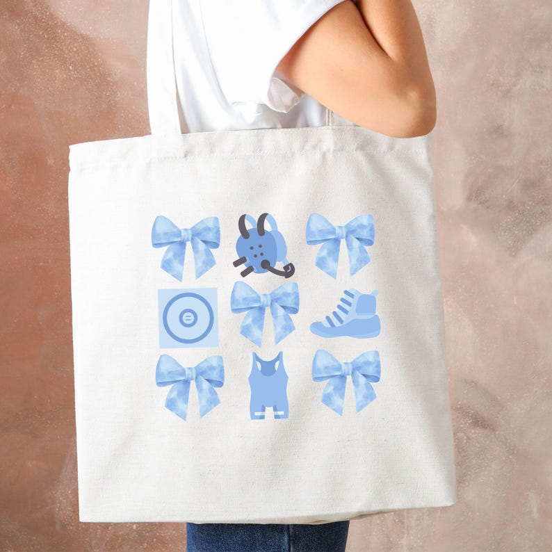May include: A white tote bag with a blue design. The design features a variety of blue icons, including a bow, a shoe, a phone, a tank top, and a circle with a line through it.