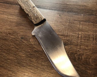 AEB-L Stainless EDC knife with optional sheath and wooden handle.