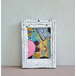 upcycled cardboard frame and paper collage