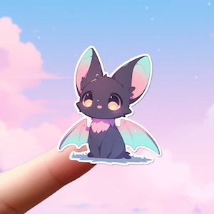 Sticker chauve-souris mignon, sticker esthétique kawaii personnage adorable, dessin animé de style Chibi, ailes colorées, ordinateur portable Kindle, bouteille d'eau en vinyle étanche