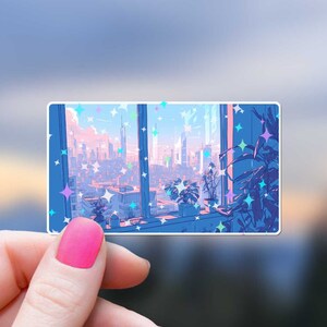May include: A sticker featuring a window view of a city skyline with a pink and blue color scheme. The city is covered in sparkling glitter. The sticker is printed on clear vinyl.