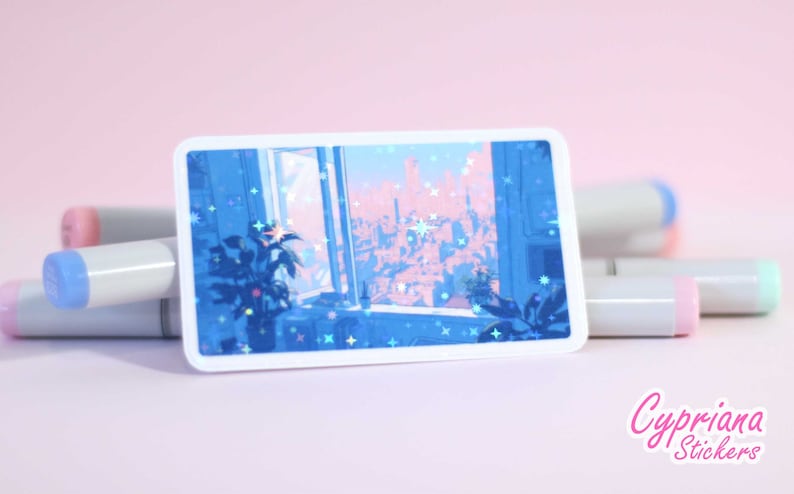 Puede incluir: Una pegatina hologr&aacute;fica que muestra una vista de la ciudad desde una ventana, con un esquema de color rosa y azul. La pegatina tiene un borde blanco y est&aacute; rodeada de marcadores.