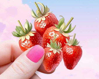 Puede incluir: Un grupo de cinco fresas maduras, cada una con piel roja brillante y hojas verdes. Las fresas se sostienen en una mano con esmalte de uñas rosa, sobre un fondo de cielo pastel.