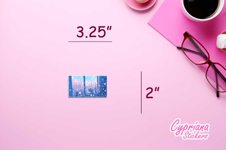 May include: A blue and white sticker with a cityscape and stars. The sticker is 3.25 inches wide and 2 inches tall. The sticker is on a pink background.