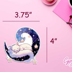 May include: A white cat sleeping on a crescent moon with a starry night sky background. The sticker is 3.75 inches wide and 4 inches tall. Cypriana Stickers.