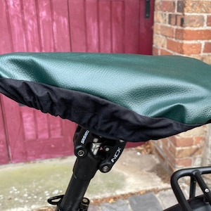 Leather rain cover for bicycle saddle