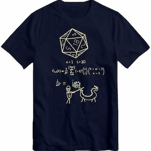 May include: Navy blue t-shirt with a white graphic featuring a 20-sided die, mathematical equations, and a cartoon illustration of a knight fighting a dragon. The text includes "n=1 s=20" and a fraction.