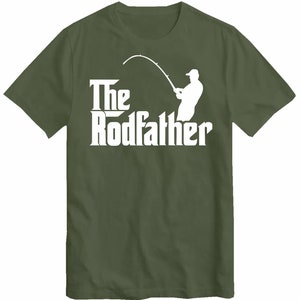 May include: A green t-shirt with a white silhouette of a person fishing and the text "The Rodfather" printed on the front.