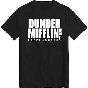 May include: Black t-shirt with white text that reads "Dunder Mifflin, Inc. Paper Company"