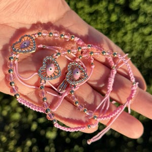 Pink eye bracelet. Pulsera de ojo rosita.