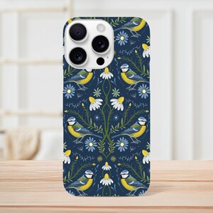 May include: A blue phone case with a repeating pattern of bluebirds, yellow flowers, and green leaves.