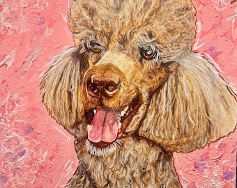 May include: A painting of a standard poodle with a light brown coat and a pink tongue. The dog is smiling with its mouth open, and the background is a textured pink with floral accents. The artwork is a close-up portrait.