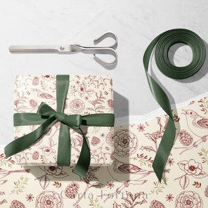 Wrapping christmas gift. Stylish festive wrapping paper, scissors