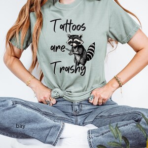 Trashy Raccoon Tattoo Artist T-Shirt: Sarcastic Tattoo Lover Gift