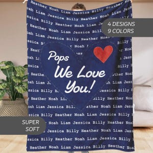 May include: A blue fleece blanket with the text "Pops We Love You!" in white. The blanket is decorated with a red heart and the names "Heather, Noah, Liam, Jessica, Billy" repeated in a pattern.