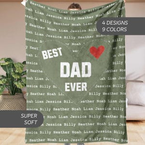 May include: A green fleece blanket with the text "Best Dad Ever" in white and a red heart. The blanket is covered in a repeating pattern of names, including "Noah", "Liam", "Jessica", "Billy", and "Heather". The text "4 Designs 9 Colors" is in the top right corner.