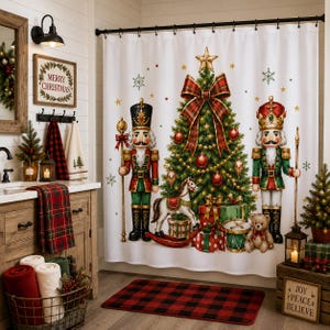 May include: A white shower curtain featuring a central Christmas tree decorated with ornaments, a large plaid bow, and a gold star. Two nutcrackers stand on either side, with a rocking horse, wrapped gifts, a drum, and a teddy bear at the base.