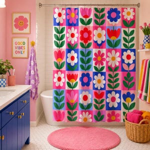 May include: A shower curtain featuring a grid pattern of colourful flowers in shades of pink, red, blue, and white, with green stems and leaves. The design consists of repeating floral motifs arranged in vertical and horizontal rows on a fabric panel.