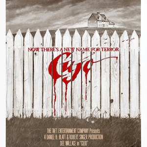 May include: Movie poster for the horror film "Cujo" based on the Stephen King novel. The poster features a red bloody handprint on a white picket fence with a house in the background. The text "Now there's a new name for terror" is written in red.