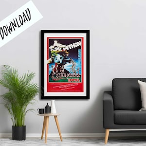 May include: A black framed poster with a red background featuring a graphic of a man in a costume with the text "Monty Python Live at the Hollywood Bowl".