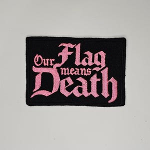 Onze vlag betekent dood: geborduurde aannaai-/doe-het-zelf-patch