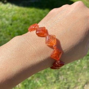 Hoge kwaliteit confetti-zonnesteenkristallen armband ~ 13 mm