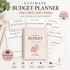 May include: A pink and gold spiral-bound budget planner with the words "ULTIMATE BUDGET PLANNER" on the cover. The planner includes pages for monthly budgets, expense tracking, and debt payoff. The image also shows a pen, paper clips, and a small plant.