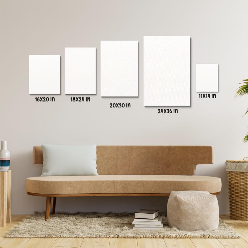 May include: Five different sizes of blank white canvases displayed on a white wall above a brown couch. The canvases are labeled with their dimensions in inches: 16x20, 18x24, 20x30, 24x36, and 11x14.
