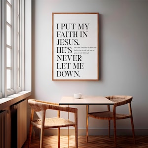Framed Bible verse wall art with a sleek and modern design, perfect for adding a touch of faith-inspired style to your living room or gifting to a loved one.