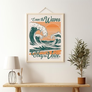 May include: A framed print with a vintage aesthetic featuring a stylized illustration of ocean waves crashing against a beach with a sunset in the background. The text reads "Even the Waves Obey His Voice, Matthew 8:27".