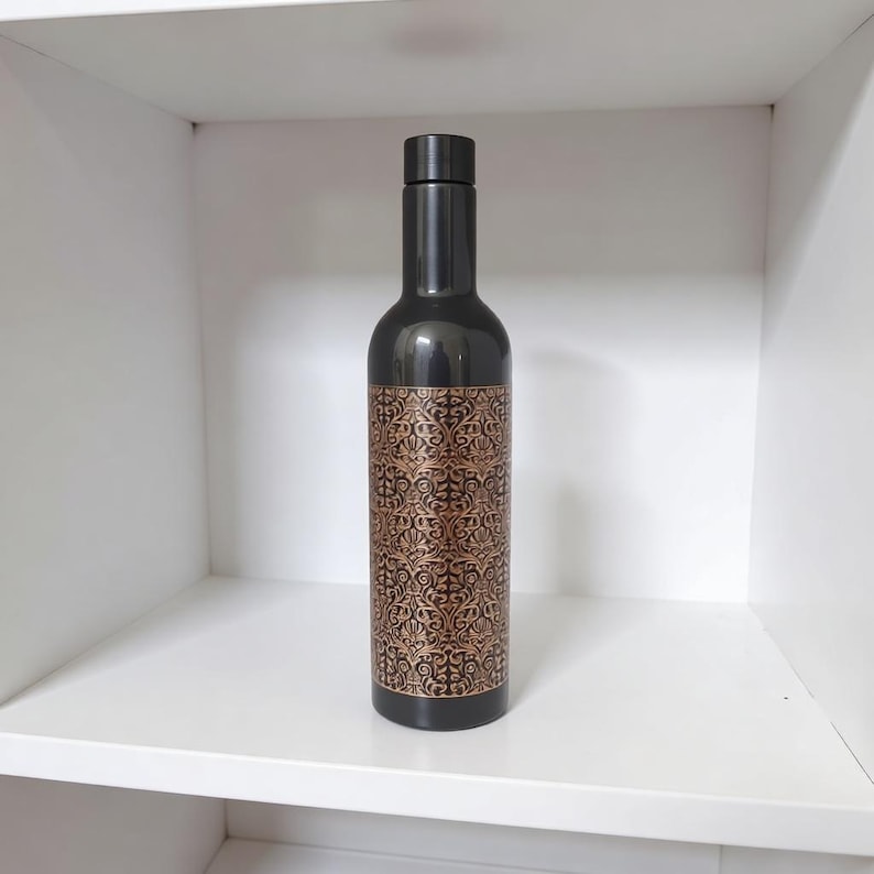 Eco conscious copper water bottle with natural finish, perfect for Ayurvedic health benefits and zero waste lifestyle.