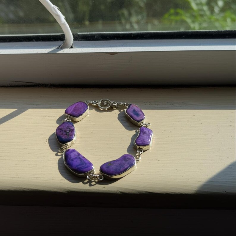 Amethyst crystal jewelry representing peace and calm energy