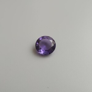 Close-up of faceted purple sapphire