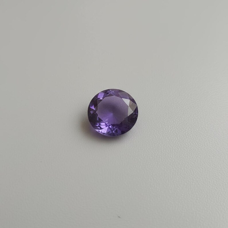 Close-up of faceted purple sapphire