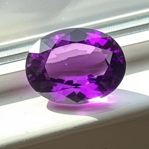 8 carat oval purple sapphire gemstone close-up