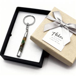 prosperity keychain with mixed gemstones and metal frame