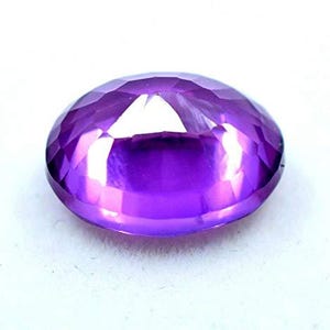 "Loose purple sapphire gemstone, oval cut, 8-9 ct, great for handmade pendants and earrings"