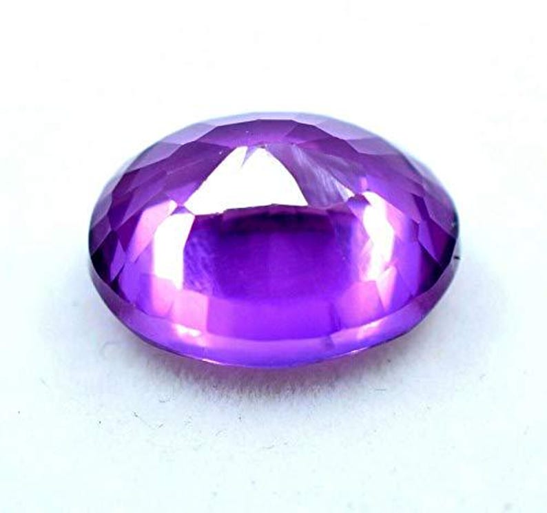 "Loose purple sapphire gemstone, oval cut, 8-9 ct, great for handmade pendants and earrings"