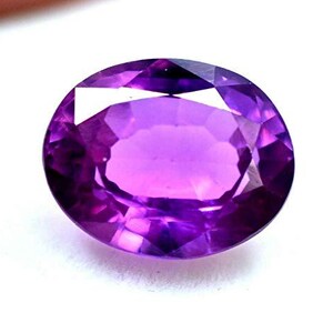 "Premium 8-9 carat oval cut purple sapphire gemstone, ideal for making pendants or earrings"