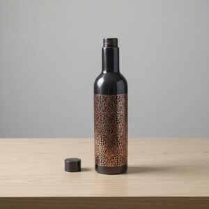Hammered copper water bottle designed for Ayurvedic water storage, natural metal drinkware promoting wellness and mindful living.