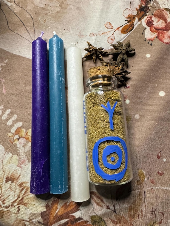 Empath shield spell kit, plus 3 candles (blue, dark blue and white) and empath shield herb mix.