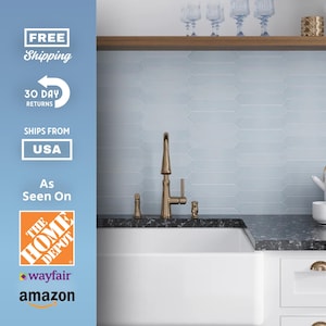 May include: A kitchen scene featuring a white farmhouse sink with a bronze faucet. The backsplash is light blue, and the countertop is dark gray. A white toaster, teapot, and cups are visible. The image includes text that says "FREE Shipping", "30 DAY RETURNS", and "SHIPS FROM USA".