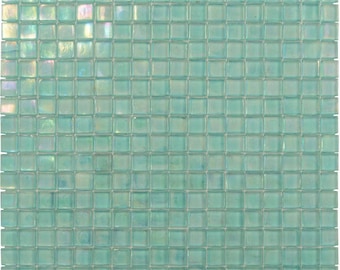 May include: A sheet of iridescent light blue glass mosaic tiles. Each tile is square shaped and measures approximately 1/2 inch by 1/2 inch.