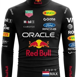 May include: Black turtleneck shirt featuring multiple sponsor logos, including Oracle, Red Bull, and Ford Racing. The shirt has long sleeves and a Dutch flag with the name "MAX" printed below. The Red Bull logo is prominently displayed.