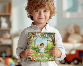 Peut inclure: Un enfant tient un livre intitulé "Oliver Explores the Great Outdoors". La couverture du livre présente une illustration d'un enfant sur une balançoire dans un parc. L'enfant porte une chemise boutonnée de couleur claire.